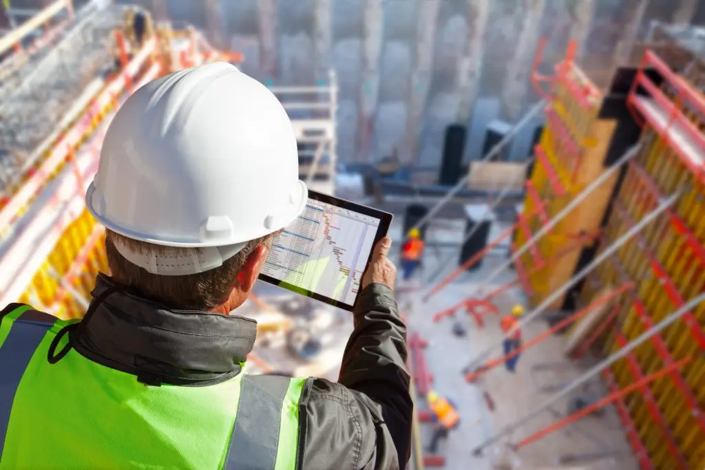 Subcontractors coordinating on an active residential construction site