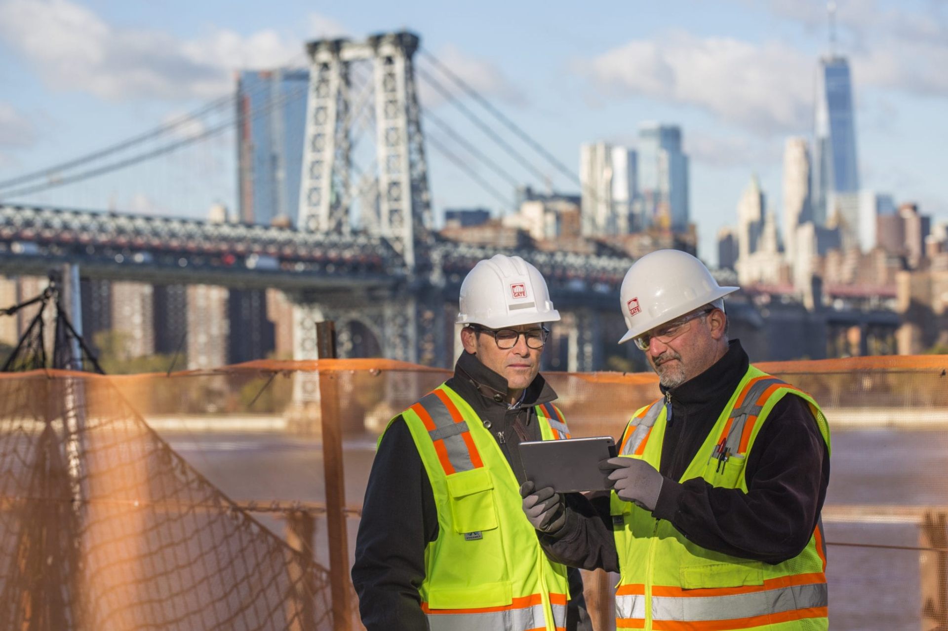 Superintendent accessing project documents from a tablet on the job site