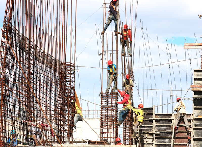 Construction team reviewing real-time project status across stakeholder roles